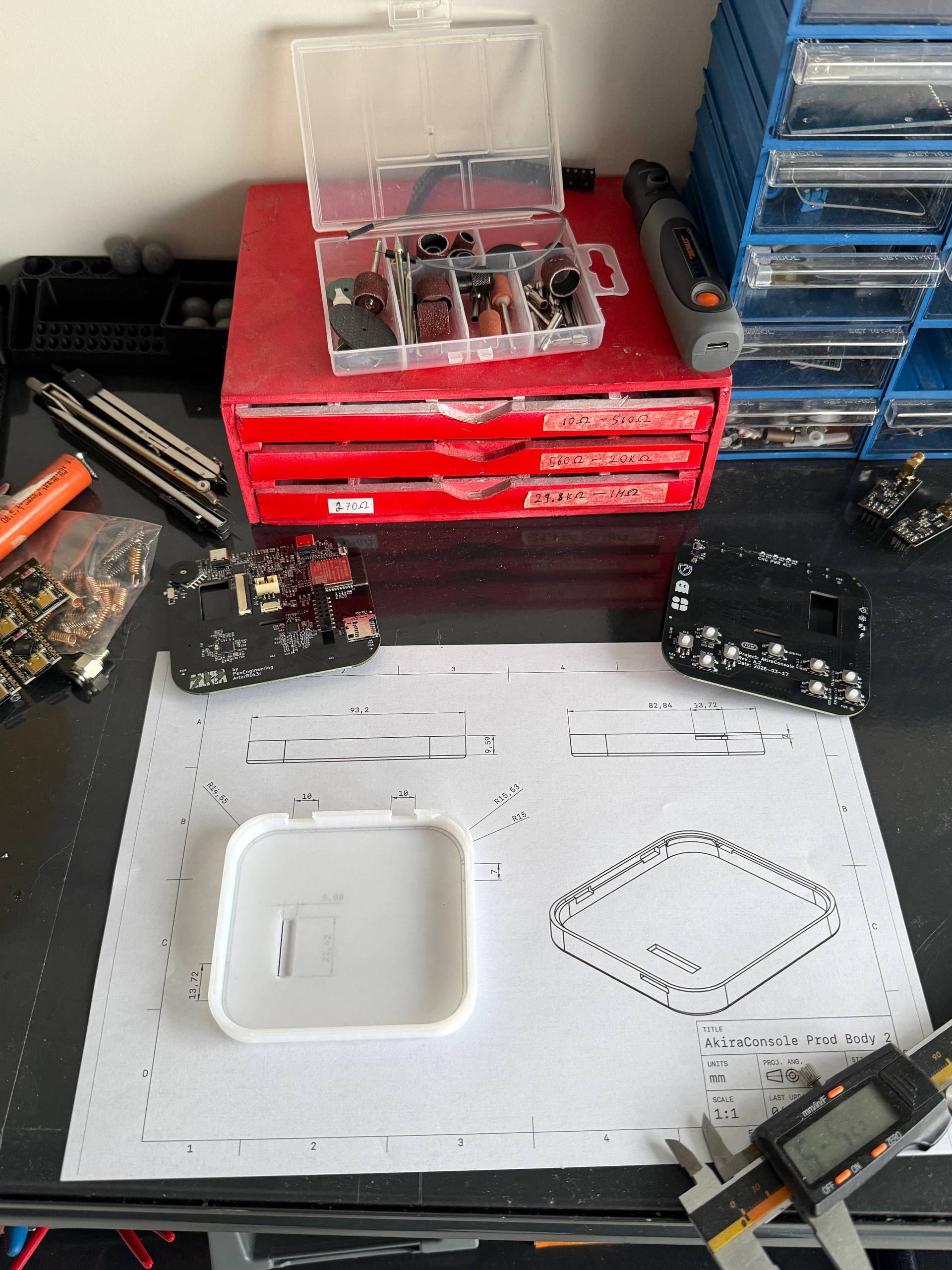 AkiraConsole prototype — 3D-printed body with engineering drawings and PCBs